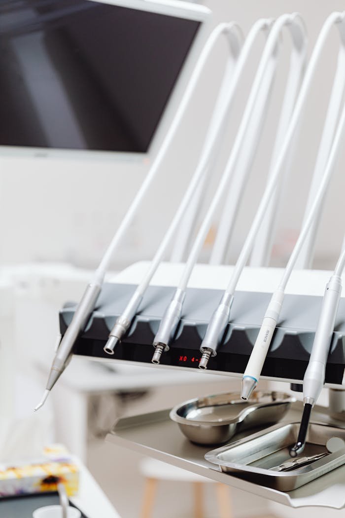 Close-up of advanced dental tools arranged in a clinic demonstrating modern dentistry technology.